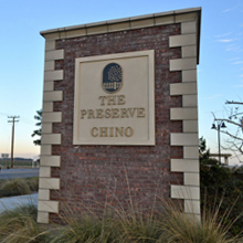 An entrance sign at the Cantata at the Preserve community.