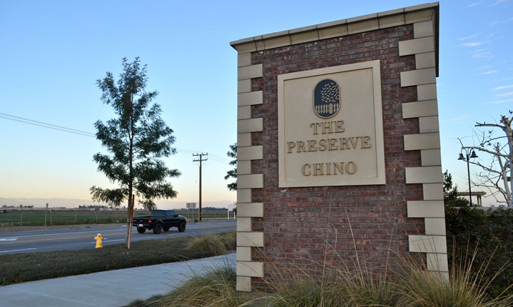 An entrance sign at the Cantata at the Preserve community.
